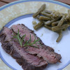 Grilled flank steak marinated in red wine and herbs